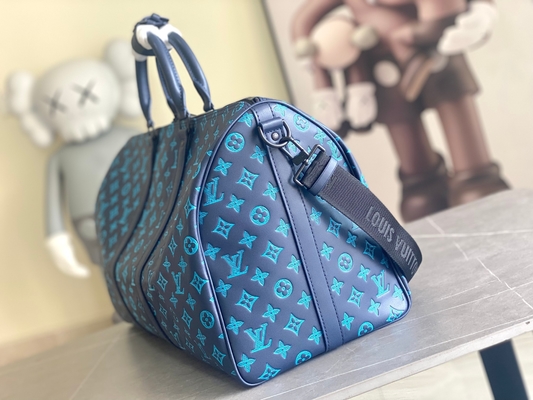 বড় ব্র্যান্ডের পুরুষদের ব্যাগ Keepall BANDOULIÈRE 50 ব্লু বোস্টন ব্যাগ